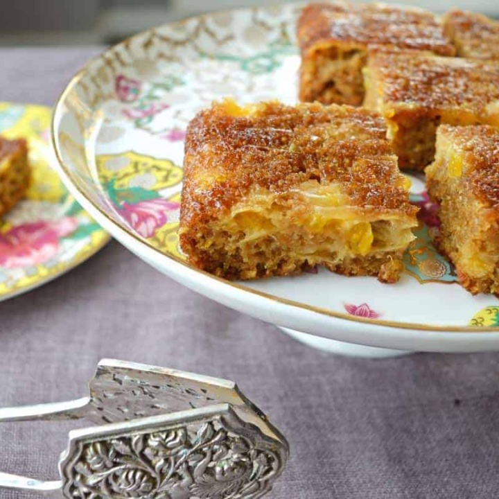 Mandarin sheet cake on a porcelain serving plate