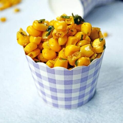 Masala corn in a purple checked cupcake wrapper