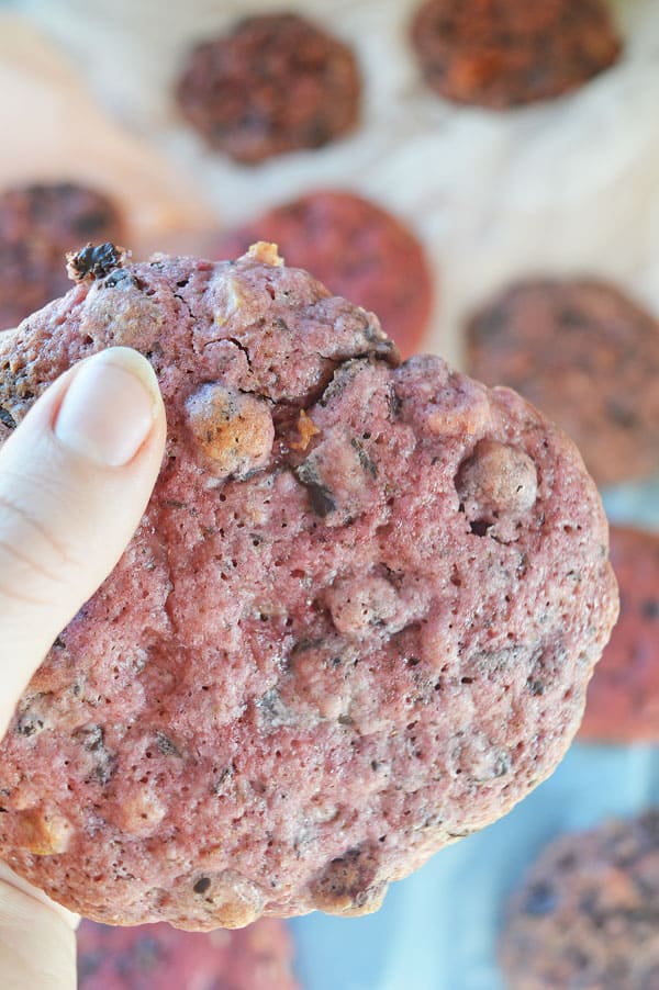 A purple chocolate walnut cookie close-up