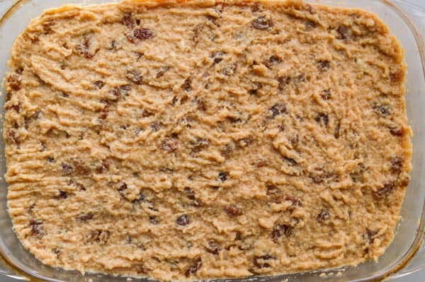 a brown filling with raisins in a glass dish