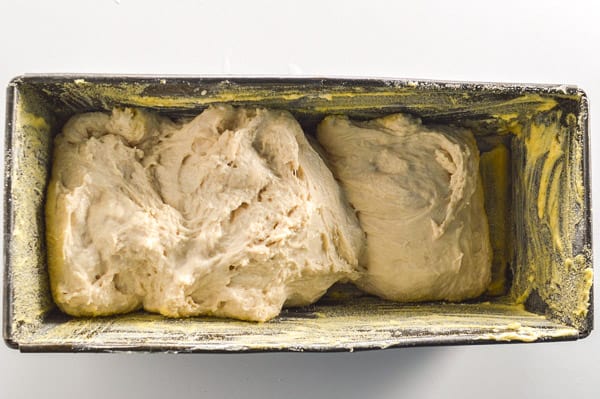 lumps of dough in a tin