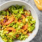 Pinnable image of salad with text Spanish salad, thefieryvegetarian.com