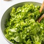 Pinterest pin image of green salad with text "GARLIC Salad!".